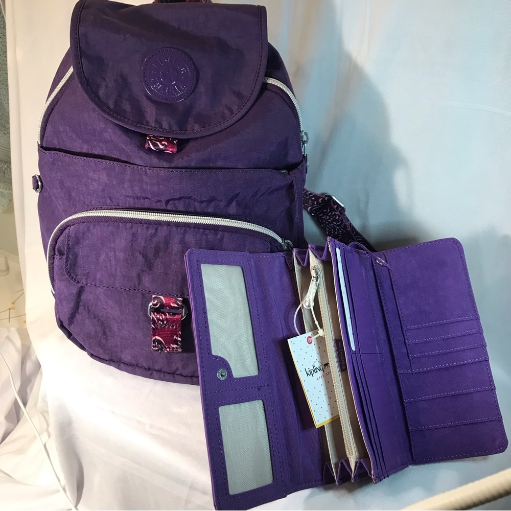 kipling backpack and wallet.  purple with a wallet